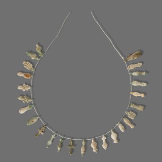 Fragment of a necklace of amulets 26 pieces, Goluchów Greater Poland Voivodeship, necklaces, grave