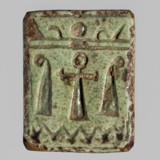 Amulet plaque with the head of the goddess Hathor;, Hathor myth, Egyptian deity; plaque amulet with