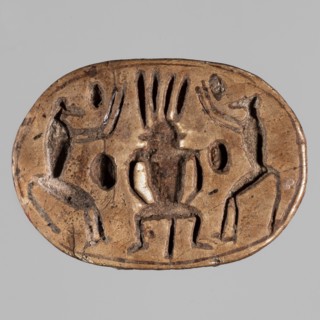 Scarab with a depiction of two baboons adoring Bes; on the reverse, a convex image of a scarab