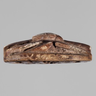 Scarab with a depiction of two baboons adoring Bes. Scarab with an image of two baboons adoring the