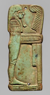 Amulet plaque in the shape of the god Imseti. Relief figurine shown in right profile as a mummy
