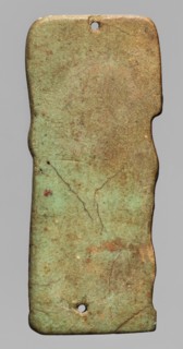 Amulet plaque depicting the god Hapi. Relief figurine shown in right profile as a mummified figure