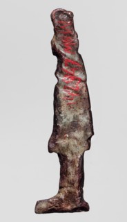 Amulet - goddess Hathor;, Hathor myth., Egyptian deity/goddess; red glass; Ptolemaic Period, 332–30
