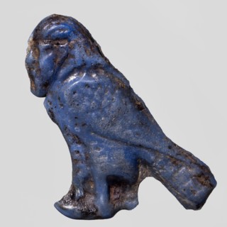 Amulet — Ba figure;, Egyptian Ptolemaic Period 332–30 BC. Navy blue glass amulet representing the