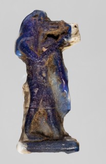 Amulet — a deity with a jackal's head Anubis, dark blue glass; Ptolemaic Period, 332–30 BC, Egypt;