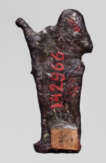 Amulet — goddess Seshat;, Dark brown glass; Ptolemaic Period, 332–30 BC, Egypt. Depicts Seshat
