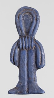 Amulet - tit;, Protective amulet in the shape of a tit knot, made of dark blue glass, with