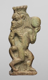 Amulet - dancing god Bes, Bes mythology. Figurine of Bes shown in right half-profile, head turned
