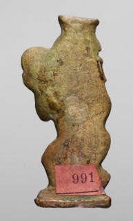 Amulet - dancing god Bes, Bes mythology. Figurine of Bes shown in right half-profile, head turned