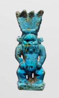 Amulet - god Bes, figurine of Bes standing on slightly crooked legs, with his hands resting on his