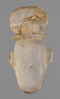 Amulet - heart with a sun disc;, sun disc iconography; protective amulet and grave good; Late