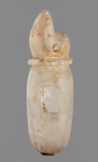 Amulet - heart with a sun disc;, sun disc iconography; protective amulet; grave goods; Late Period,