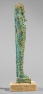 Ushabti of Semen-Ptah-Psamtyk. Wigs, funerary figurine mummy-shaped, hieroglyphs, beards facial