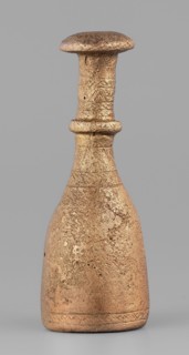 Bottle-type idol base, unknown Luristan workshop. Bottle-shaped base with a long, narrow neck