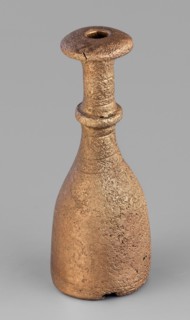 Bottle-type idol base, unknown Luristan workshop. A bottle-shaped base with a long, narrow neck