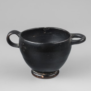 Black-finished skyphos, Type B. Thin-walled skyphos with a deep bowl and annular foot. One handle