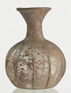 Flask; body in the shape of a flattened sphere, decorated with ribs; maker, Syria, 2nd–3rd century