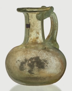 Jug, spherical, flattened body, cylindrical neck, flared spout and ribbon-shaped handle with