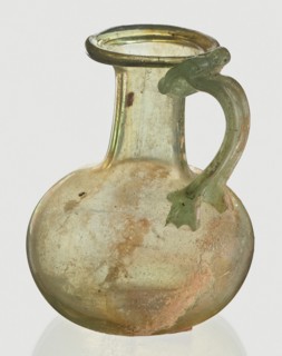 Jug, Egyptian workshop, spherical flattened body, cylindrical neck, flared spout and ribbon-shaped