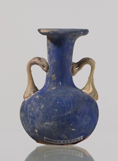 Amphora, bulging belly with a rounded bottom, long cylindrical neck with a thick ring-shaped rim;