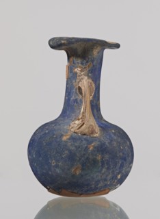 Amphora, bulging belly with a rounded bottom, long cylindrical neck with a thick ring-shaped rim;