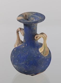 Amphora, bulging belly with a rounded bottom, long cylindrical neck with a thick ring-shaped rim;