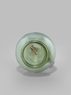 Oinochoe. Transparent, light green glass. Spherical belly on a foot with a clearance, created by