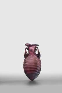 Amphora, unknown eastern workshop; De Tommaso form 20. Translucent manganese glass with an