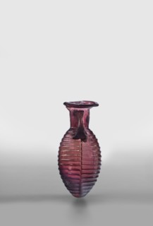 Amphora, unknown eastern workshop; glass vessels, Type: De Tommaso form 20. Translucent manganese