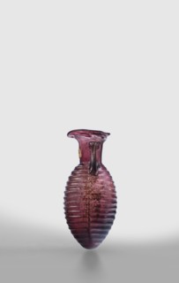 Amphora, unknown eastern workshop; Translucent, manganese glass; elongated ovoid body with