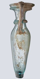 Bottle; eastern workshop, 3rd–4th century AD. Transparent bluish-green glass, free-blown, with a