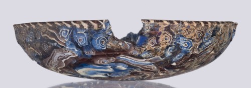 Bowl, Egyptian workshop. Mosaic glass bowl with flat bottom; walls widen evenly toward the top then