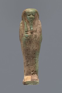 Ushabti, Hor-em-saf ca. 664–525 BC. Mummy-shaped figurine made of green faience. Stocky build,