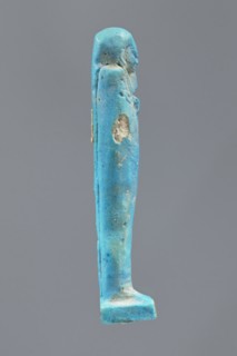 Ushabti, Mummy-shaped figurine made as grave goods, standing on a base with the back supported by a