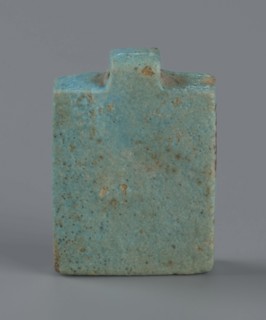 Amulet – plaque with a triad of deities: Harpocrates Horus, Isis, Nephthys. Amulet in the shape of