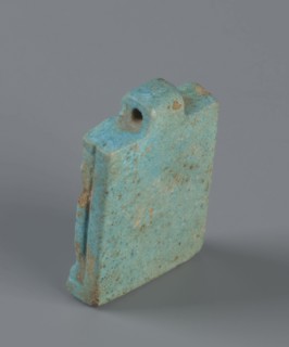 Amulet — plaque with a triad of deities: Harpocrates Horus, Isis, Nephthys. Amulet in the shape of