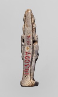Amulet - god Horus; double crown on the head; Egyptian deity depiction; material/technique: amulet;