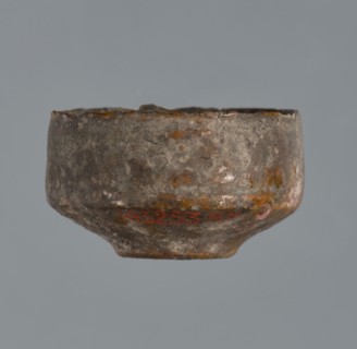 Miniature scoop with a flat bottom; walls widening diagonally to 1/3 then running vertically