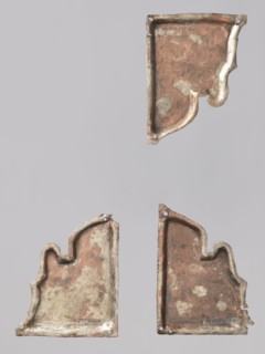 Three fragments of a Gospel book cover: two depict St. Mark and one St. Luke. Luke the Evangelist