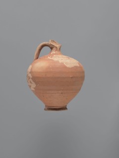 Jug, unknown Aswan workshop; type: jug; materials: kaolin clay Gempeler type IA with red-brown