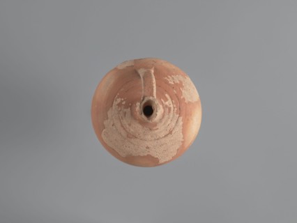Jug, unknown Aswan workshop. Jug with a rounded rim, a narrow and upwardly flaring neck with a