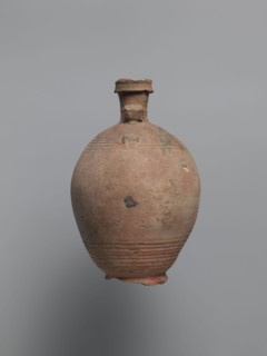 Bottle, unknown Egyptian workshop. Bottle with a rounded and falling rim, concavely profiled.