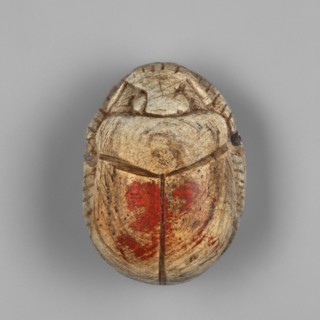 Scarab - a forgery? Scarab with a pseudo-inscription on the underside of the base. Traces of red