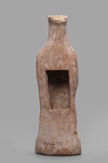 Figurine of a woman wearing a polos, from an unknown Boeotian workshop; female figurine, Boeotia,