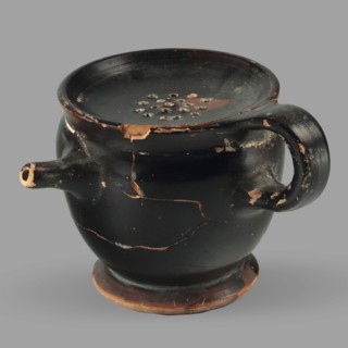 Askos with spout and strainer, unknown Attic workshop. Greek pottery toilet vessel with tubular