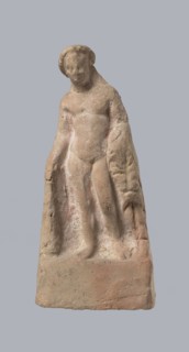 Terracotta figurine of Heracles. Figurine of a standing naked Heracles in a contrapposto pose;