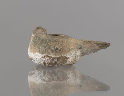 Oil lamp, Persian, 12th century, Iran. Ceramic oil lamp with a round container with a flattened