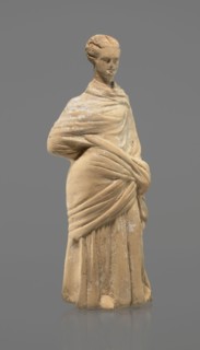 Terracotta figurine of a standing woman, terracotta, female figurine, himation, chiton, Tanagra