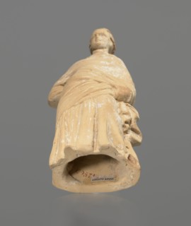 Terracotta figurine of a standing woman, terracotta, female figurine, himation, chiton,