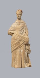 Terracotta figurine of a standing woman, terracotta, female figurine, himation, chiton, Tanagra